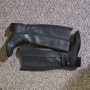 Gray leather riding boots